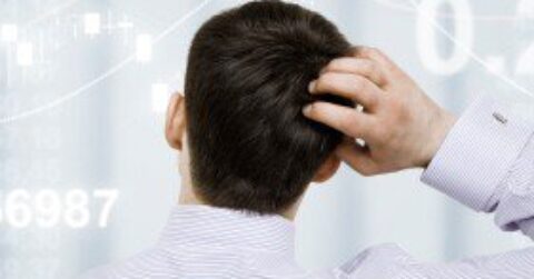 Businessman Scratching His Head