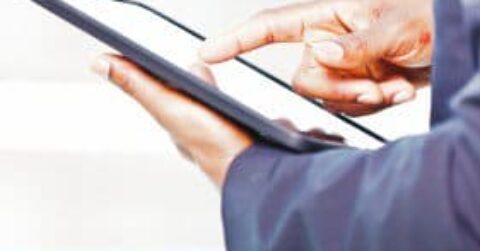 Businessman Using Touch Screen Mobile Device