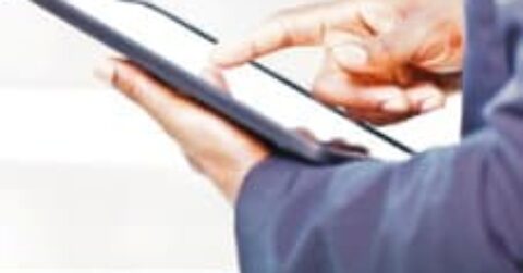 Businessman Using Tablet