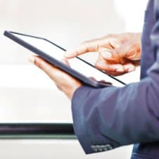 Businessman Using Tablet cropped
