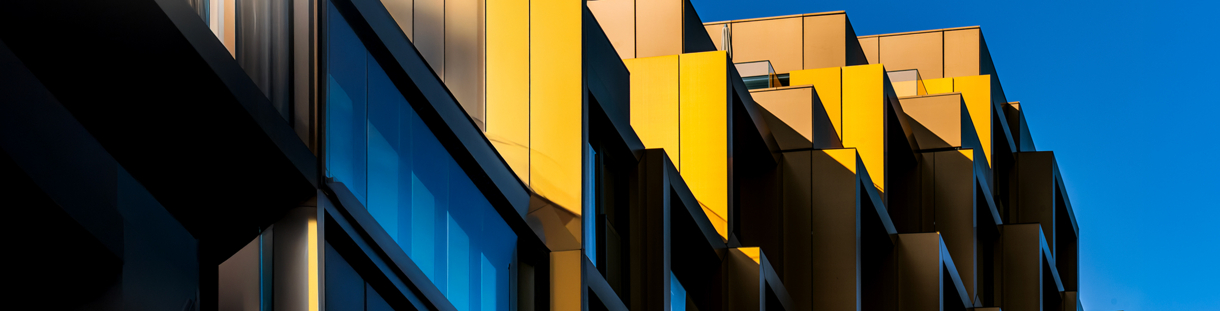 Member page YellowBuilding 2400x612 1